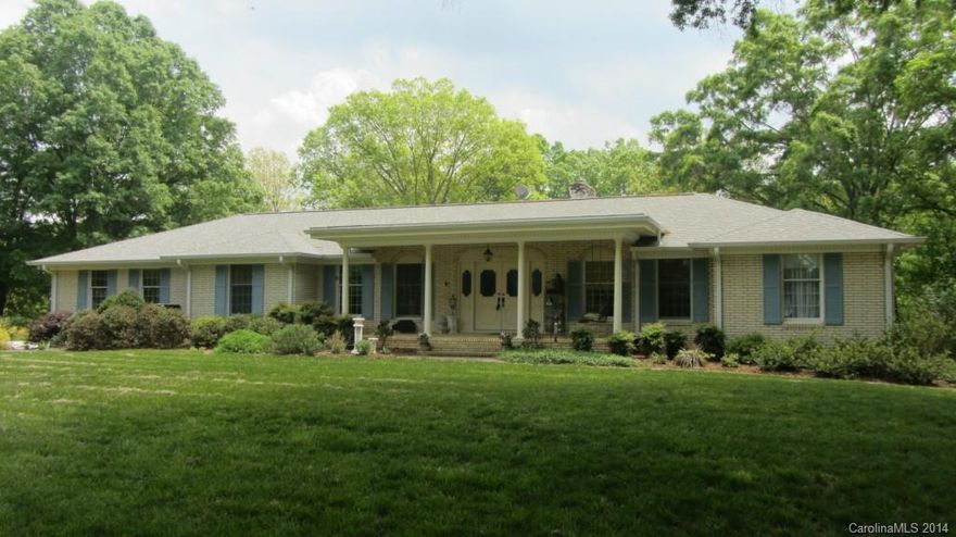 Lovely all brick home located in a quiet country setting.  Family Rm w/wood burning FP, cathedral ceiling, grass cloth wallpaper.  Beautiful French Country style Kit w/bkf area overlooking a very private wooded backyard, tile countertops, tile floors, tons of cabinets, built-in appliances.   Entry Hall, LR and DR.   Very Large Utility Rm w/walk in pantry.  Over 4200 Heated Sq.FT. Appraisal on file