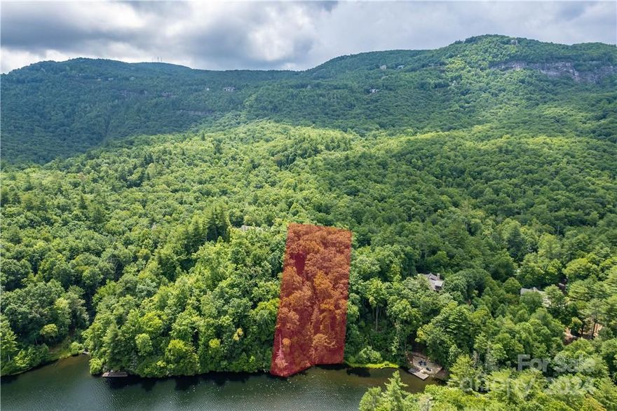 Ready to build lot on prestigious Lake Cardinal within Lake Toxaway Estates. The building site has been cleared with well and septic permits active. Great street with walking distance to the Toxaway River Trail which is one of the most scenic trails in Lake Toxaway. Mountain and lake views, easy access to the Lake Toxaway Country Club, Marina and Greystone Inn. Come and see what Lake Toxaway has to offer!