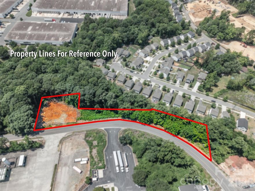 Prime opportunity with excellent potential in a growing area. This road frontage property offers convenient access and is situated near established residential communities and ongoing development. Ideal for investment, or future expansion, the property features a desirable location with a mix of wooded surroundings and nearby infrastructure. Property lines shown are approximate and for reference only.