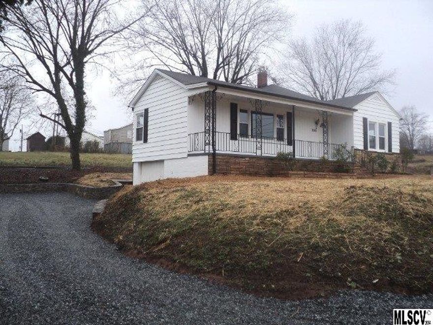 CUTE AS CAN BE! This 2BR/1BA has been completely redone! New multi-zone ductless heat pump, new windows on main level, new flooring, new water heater, new insulation in attic & under floor. Full basement has single garage. Beautiful new rock sidewalk. This home sits on 1.04 acres...plenty of room for a garden.