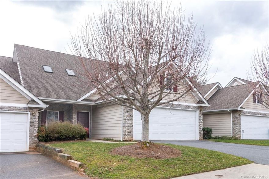 Lock "n" go lifestyle in this well cared for unit! Hardiplank & stone exterior with crown moldings, 9' ceilings, skylights, & storage galore. Exterior & lawn maintained by low HOA fees. Walking trail sidewalks with beautiful sunset views! 1st floor master suite & 2 car garage - upstairs has extra 2 bedrooms, bonus room, & walk in attic storage. West Asheville treasure!