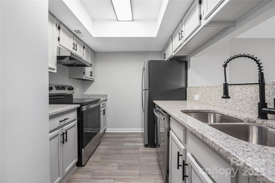 Step into this updated two-bedroom, two-bathroom condo in the heart of Charlotte, NC! With 894 square feet of living space, this cozy unit features modern touches and a beautiful view creating a welcoming ambiance. Situated on the bottom floor of a third-story building, enjoy waterfront living and peaceful views. Don't miss out on this opportunity to own a tastefully updated unit in Charlotte!