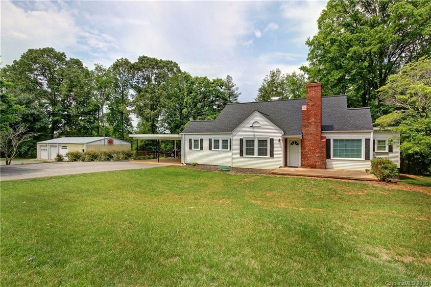 Beautiful & Charming Home located on 2.75 acres in North Iredell! HUGE 49x26 Shop and 12x16 Insulated Outbuilding. Spacious Rooms throughout, Nicely Renovated and ready to move into condition. Close to Grocery, Pharmacy, & more in cute & quaint Harmony, NC!  Large shop offers 2 bay garage doors, plumbed for 1/2 bath, & office space with Alarm system.  Adorable upper bonus room/3rd bedroom offers gorgeous wood floor and walls and NEW HVAC. Exceptionally well kept home. Priced to sell!