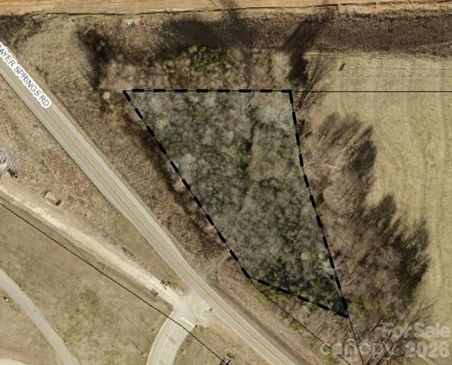 Almost 2 acres available for your stick built, modular or manufactured home. Located directly across the road from Hanna Park with playground, soccer fields and much more! Already has water hook up and cleared for a homesite. YES, YOU CAN PLACE A MANUFACTORED HOME! Single and Doubles Wides ALLOWED! Septic is needed. Per Cleveland Co Environmental, there was a septic permit issued in 2015 but has since expired so a new permit is needed.