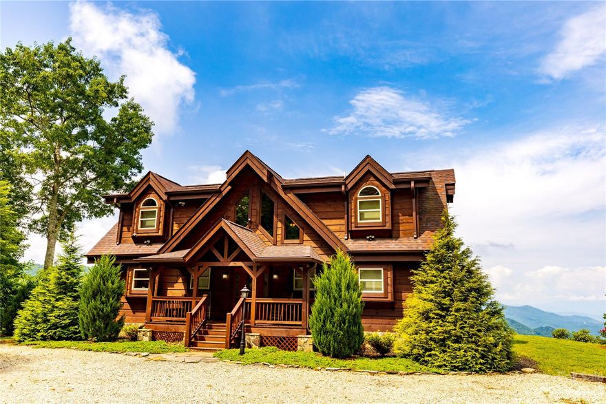 This Stunning Custome Log Cabin known as the Soaring Eagle is ready to be sold to someone looking for AMAZING VIEWS! Located at the top of the ridge in prestigious - Alarka Highlands. Currently being used as a super successful Vacation Retal Program Grossing over $65K on average. Beautiful custom beams with soaring ceilings throughout. Open decking, some covered, Gable Porch Overlooking the layers and layers of mountain views. Large Kitchen with leathered granite countertops and handmade cabinetry. Beautiful Stone Gas Fireplace in the Living Room. Large Loft for gaming. Large Hot Tub and the edge of the mountain to take in the Amazing Sunsets. Entire cabin has been recently re stained, Huge storm windows that let in the mountain views throughout. If you are looking for an amazing Log Cabin in the Mountains overlooking the National Park at over 3000Feet? This is it. Showings are scheduled around vacation rental schedule. High Speed Internet by Balsam West.