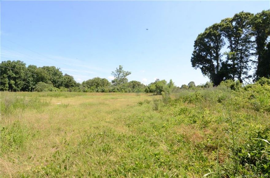 This prime commercial/retail site, with 350' of frontage, is located approximately ½ mile from Buster Boyd Bridge on Hwy 49 (Charlotte Hwy) in Lake Wylie SC.  Recently surveyed, this property is mostly flat and can accommodate several businesses including fast food, automotive repair, convenience/gas, or discount retailer.
SPECIAL NOTE: SC DOT 2015 TRAFFIC COUNT IS 34,700 VEHICLES PER DAY PASS BY THIS LOCATION