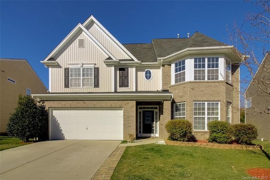 Gorgeous! YES- 7 bedrooms, 4 baths located in the Farm at Riverpointe. Beautiful hardwood floors, plush carpet, and tiled bathroom floors. Grand two story great room. Additional family room with built-in shelves. Large kitchen featuring an electric cooktop and island - plenty of countertop space. Third story loft perfect for billiard's or home theatre. Office niche. Great open floorplan for entertaining family and friends! Beautiful large windows. Invisible fence in the backyard for dogs!