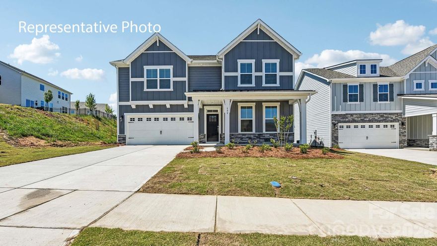 Check out 527 Mahogany Road in Westport in York, SC.

The Lawson is a two-story home offered at Westport in York, SC. This new two-story plan offers four bedrooms, including one on the main level, as well as three bathrooms, a loft and a two-car garage.

As you step onto the porch and into the home, you’ll be greeted by an inviting foyer and a bedroom perfect for a guest room or a home office. You are then welcomed into a spacious family room area that opens to the kitchen area. The chef’s kitchen is equipped with stainless steel appliance, large granite countertops with tile backsplash, ample storage space, a walk-in pantry, and a kitchen island. 
Upstairs the primary bedroom offers a large en-suite bathroom with a soaking tub and shower, and large walk-in closet. The additional two bedrooms provide comfort and privacy for every household member long with a bathroom and convenient laundry room. A loft space on the second floor can be used as a media room, home office, or playroom.

With its thoughtful design, spacious layout, and modern conveniences, the Lawson is the home for you at Westport in York, SC.

All this and a large pool, clubhouse to come and only a few minutes to Lake Wylie boat ramp and park.