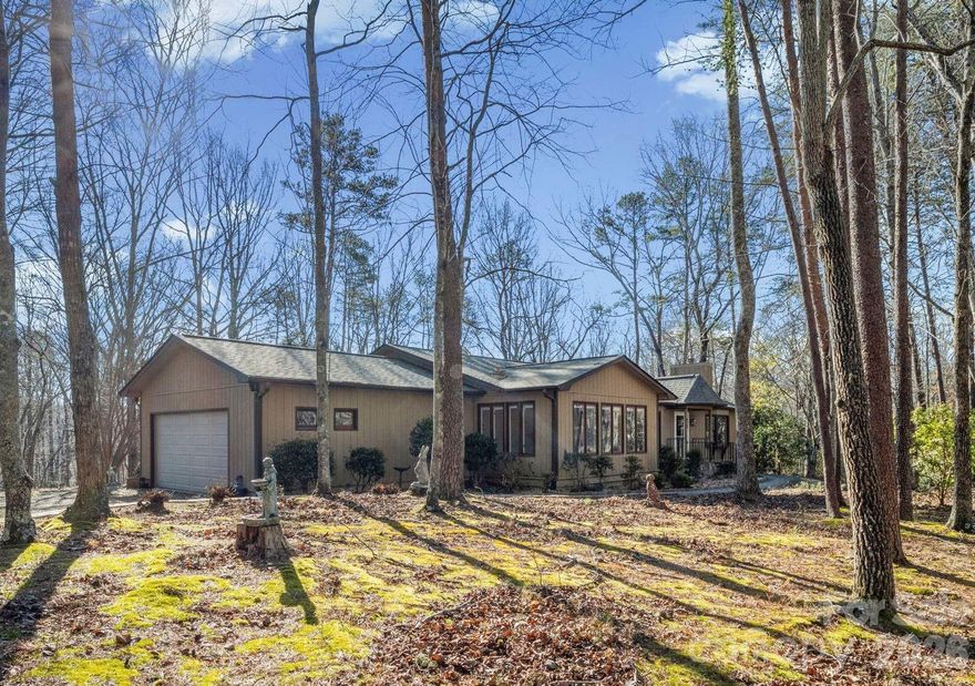 You’ll fall in love with this beautifully updated home in sought-after Morgan Chapel Village. Thoughtfully designed with all living spaces on one level, this residence offers both comfort and style with gorgeous wood and tile flooring throughout.
The spacious living room centers around the stone fireplace with gas logs. The attractive kitchen has been tastefully renovated with new granite countertops, a stylish tile backsplash, tile flooring, and stainless steel appliances. An adjoining breakfast nook provides a charming dining space and easy access to the deck. In addition, the formal dining room has ample space for family gatherings. 
The primary suite offers a large walk-in closet and a fully renovated private bath complete with a walk-in shower and double vanity. Two additional bedrooms provide flexibility for family, guests, or a home office, while the second fully renovated bath features a heated jetted tub for a spa-like retreat.
A generous family room adds even more living space, perfect for entertaining, hobbies, or a media area.
Situated on a private 1.02-acre lot surrounded by natural woods, the property also features a fenced backyard. Known for its spacious homesites, wooded surroundings, and peaceful atmosphere, Morgan Chapel Village offers a rare combination of privacy and convenience.