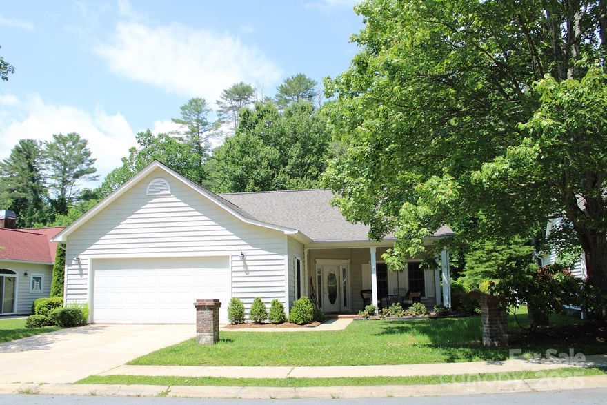 Charming and low-maintenance living in desirable Deerlake Village! This 2-bedroom, 2-bath home offers an open floor plan with a spacious sunroom that brings in abundant natural light year-round. Enjoy peaceful mornings on the covered front porch or entertain guests on the private back patio. The home features a level driveway, attached two-car garage, and easy-care landscaping. Neighborhood amenities include a community lake, walking trails, and clubhouse. Just minutes from downtown Brevard, shopping, and medical facilities—this is mountain living at its most convenient!
