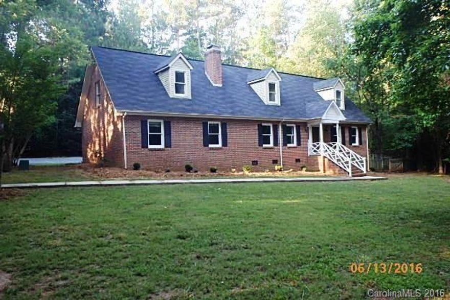Move-in ready all brick home on a very private .86 acre wooded lot. Minutes to town. New roof, new paint inside and out, new carpet, vinyl. Re-finished wood floors in entry, dining and kitchen. 2 new HVAC units. 3 bedrooms and a large bonus room. Living room with Fireplace. Granite counters and new appliances in the kitchen. Oversized 2 car garage with large storage area.