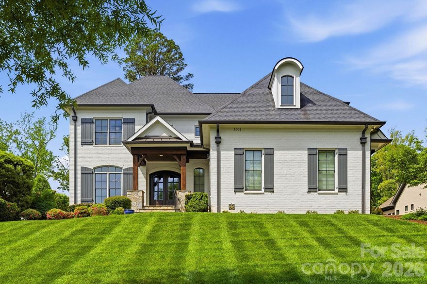 Welcome to 1605 Arborfield Commons in the lovely Stevens Grove neighborhood! Beautifully landscaped with a private fenced backyard, this home is perfect for indoor-outdoor living. It features a covered stone porch, brick-paved patio with pergola, and fire pit. Inside, an open floor plan showcases a gourmet kitchen with Thermador appliances, 6-burner gas range, farmhouse sink, large breakfast area and butler’s pantry with sink, wine shelves and beverage refrigerator. The oversized kitchen opens into the family room with custom built-ins and a modern fireplace. The main-level primary suite offers a spacious retreat with dual vanities, freestanding tub, water closet, and two large walk-in closets. The convenient drop zone off the garage includes a hidden stackable washer and dryer and lots of storage. Upstairs features three additional bedrooms, each with attached bath. One of these is currently being used as an office. Upstairs also has a large bonus room, dedicated gym with full bath, and a second laundry room with sink. Walk-in attic access and exceptional storage throughout complete this impressive home.