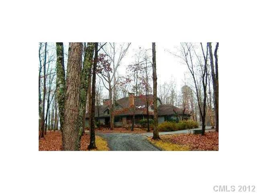 Heart of Waxhaw, potential private equestrian estate or development investment opportunity.  Custom built, state of the art, mountain home inspired estate house. Master retreat separated by solarium.  Floor to ceiling Anderson windows, sub zero, Bosch & Thermador appliances. Screened in sun porch. Property includes income producing 2BR farm house, equip/run-in shed & fenced pastures. Dog Kennels.