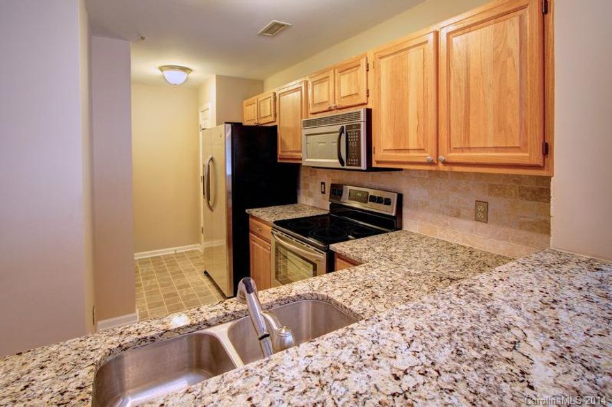 Completely renovated Unit in a great location with lake access.  Close to down town Davidson, highway, shopping, and dining. This unit is better than new, including Stainless steel appliances, granite counter tops, tile backsplash, new hardware, fixtures, carpet, and fresh paint throughout. Main floor features living room with; dining area; The master suite bathroom features a garden tub, and large walk in closest.  The second master includes a full Jack and Jill bath, and large closet.