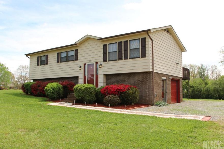 Updated 3 bedroom, 1 ½ bath, split-foyer home that is ready to move in.  Updates include kitchen backsplash & countertops (2015), SS appliances (2014), tile flooring, fresh paint, vanity sinks, heat pump (2013+-).  This home has newly refinished hardwoods & tile flooring throughout.  The living room is open to the dining area which accesses the large back deck.  The kitchen has an island, pantry & SS appliances.  Downstairs is a clean unfinished basement w/ a workshop area, & single car garage.  This home has a large backyard and sits on a corner lot.  Great value.