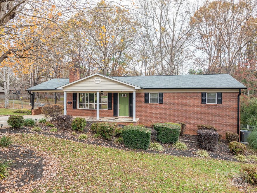 Check out this timeless 3BR 1.5 BA brick ranch with full unfinished basement and attached carport in Hudson NC! Main level features 3BR with shared full bath. Beautiful hardwood floors in kitchen, dining area, living room and hall. Downstairs in the unfinished basement you’ll find laundry, half bath and a blank slate perfect for storage, workshop, you name it. Even has roll up exterior door! Outside you’ll find beautiful landscaping, rear chain link fenced yard with deck and outbuilding. Just mins from Hwy 321 for an easy commute!