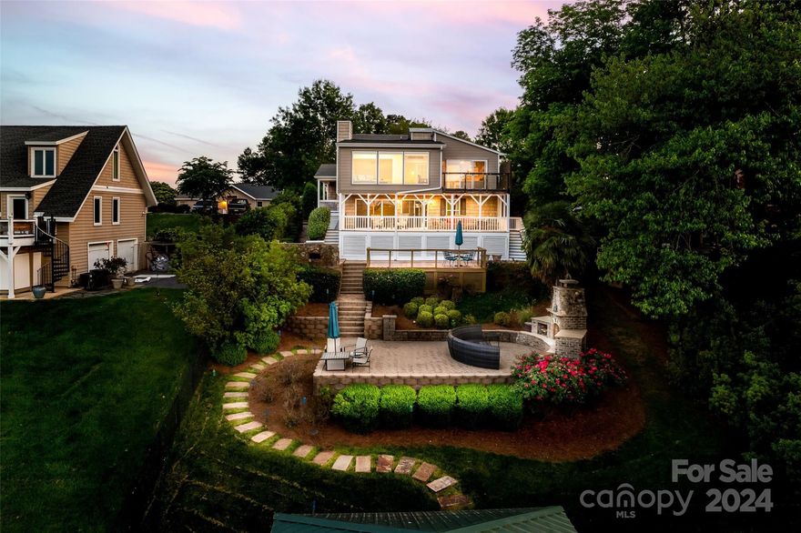 **Agents still feel free to show, offer is contingent and we are still accepting offers** Beautiful lakefront home in the Peninsula of Tega Cay! These are the views people spend money to go on vacation for a short week and this can be your home! Three bedroom, two full bath on beautiful Lake Wylie. You will never want to leave home! Home has all updated bathrooms, and nearly every room has a lake view. Just wait until you step outside whether it's off the primary bedroom balcony over looking the water, the main deck or simply cuddled up on the couch overlooking the sunset! Entertaining is made easy with the outdoor kitchen, custom fireplace, and your own private dock and boat slip! Don't miss out, schedule a showing today! New roof, HVAC replaced in 2023/2021!