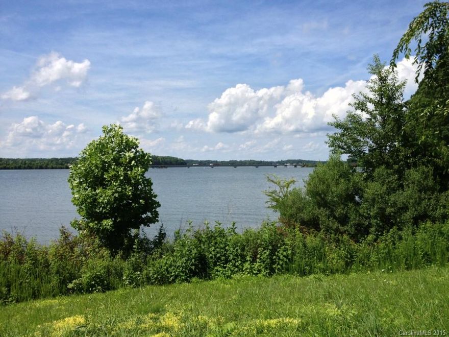 Priced Below Tax Value. Main Channel Waterfront Lot. No time limit to build. Bring your own builder. Architectural Review and Approval Required. Off site septic lot. Well and Septic to be installed by Buyer.