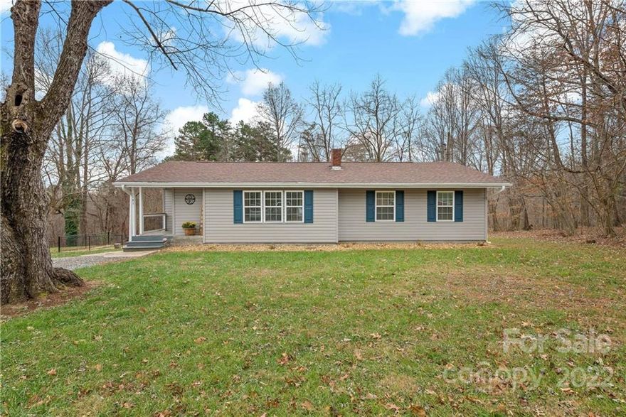 Back on the Market!!  Super cute house located close to downtown Marion!  Beautiful 2 bedroom, 2 bath home that was updated a few years ago.  The current owners use the third room as an extra bedroom.  The kitchen features easy close cabinets, granite countertops, and stainless steel appliances.  Spend the evenings by the fire pit in the backyard or enjoy sitting on the semiprivate back deck.  The backyard is also fenced in, the perfect spot for your pet.  New roof installed in 2023.  The property is located 5 minutes from downtown Marion, 30 minutes to Asheville and 30 minutes to Morganton.