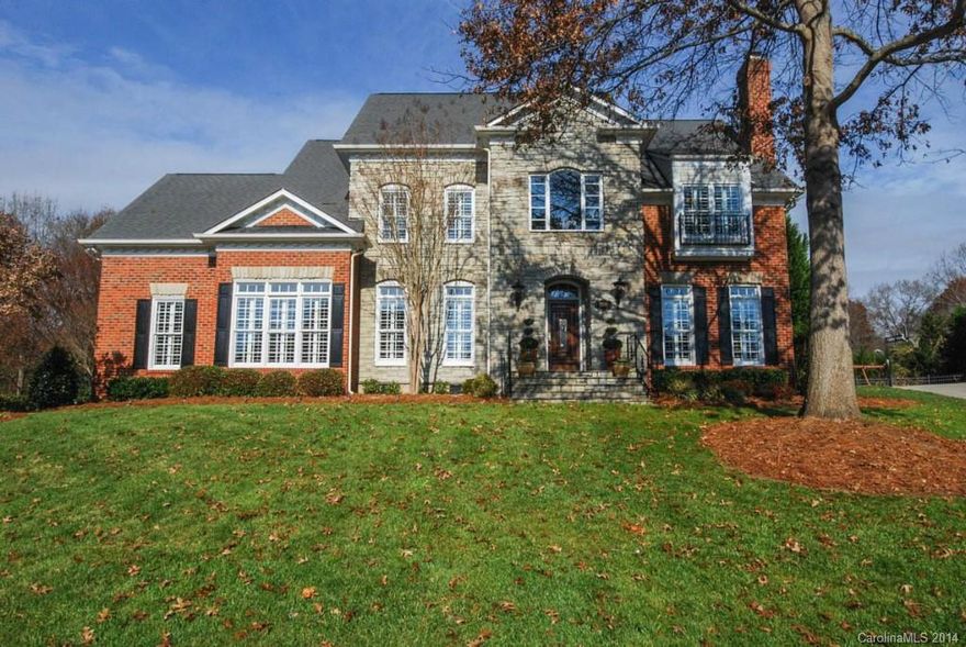 Beautiful home on a flat cul-de-sac lot.  The kitchen has been completely remodeled and it is really nice.  4 full baths (all updated), home office (could be a 5th bedroom - in addition to bonus room), large master suite with a sitting area and spacious master bath.  Plantation shutters, irrigation system, walk-up stairs to huge attic storage area, 10 foot ceilings on main level, lots of hardwood floors, new carriage style garage door, 2 fireplaces, and many other features.  Shows like a model!