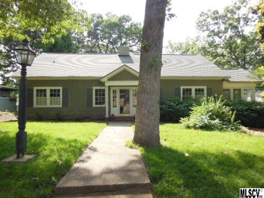 This charming one-level home with finished space on the upper level boasts 9' ceilings, heart pine floors, wormy chestnut kitchen cabinets, stainless appliances, granite counters, updated MBA with tile shower, custom detached garage & cheery sun room. The current owner replaced 39 windows, re-landscaped, added the garage, reworked the kitchen pantry/back door area & converted the existing screen porch into a year-round sun room. Excellent storage throughout the house & the upstairs offers 2 additional bedrooms, beaded board walls & a full bath with a ball & claw tub! Convenient to town, schools, shopping & the hospital, this wonderful home offers tons of personality!