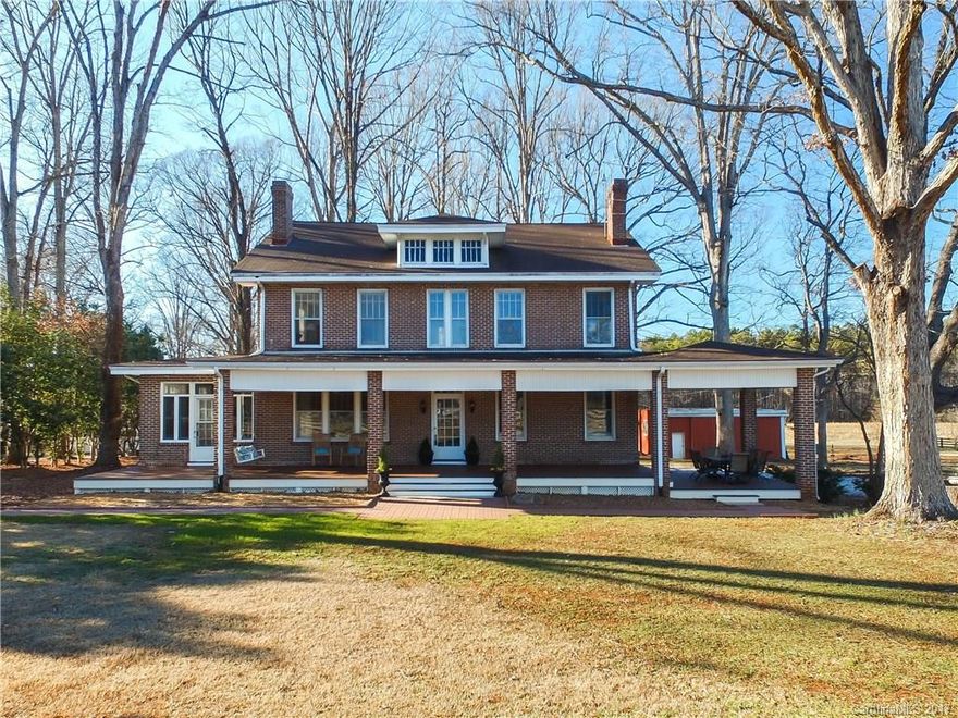 This beautiful home is your chance to own a piece of history, with its grand front porch, repurposed carriage house, spacious dining room and updated kitchen.  This home boasts 4431 square feet of lovingly restored space.  Relax with a good book in the stately sunroom, pass through the butler's pantry to the remodeled kitchen, or stretch your legs on the back deck and take in 2.3 acres of countryside.  This 1926 beauty has all the charm of the past, but modernized for ease of enjoyment today.