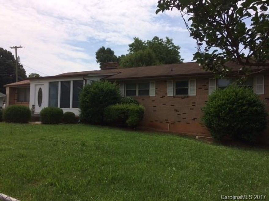 Property previously operated as a Florist business with the attached ranch home and breezeway to the torn
down structure. The ranch home with full walk-out basement is now a fixer upper and being sold "as is"
This large corner lot goes from Gaston Avenue to Airline Avenue and consists of nearly an acre.