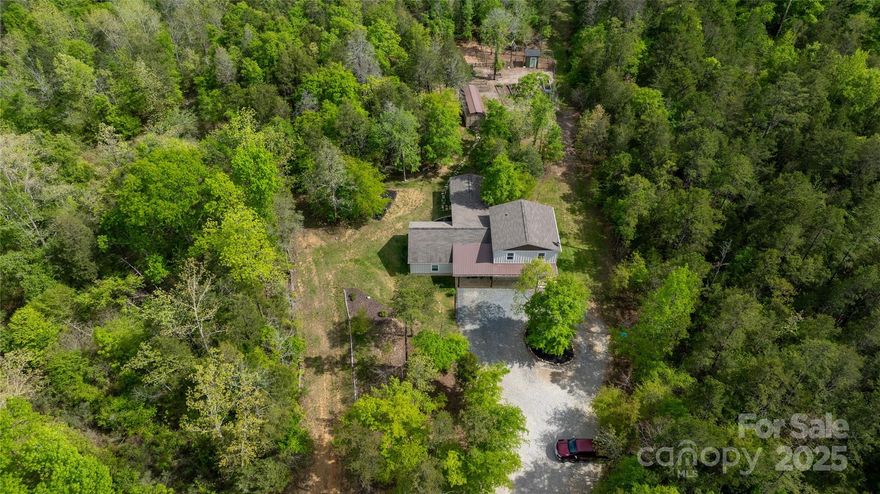 Everything you have been looking for! Located on 17 acres of beautiful riverfront property, this almost new  home with so much to offer for "homesteading" by the river. The house has so much charm with covered front porch, high ceilings and open floor plan with the addition of a sunroom and a covered porch overlooking the garden and beautiful landscape and truly a dream kitchen to gather and cook for a few or many. You will enjoy the space to roam and retreat. There is a perfect second building site on this property and the current well could be shared with another home. Enjoy deer hunting and fishing on your own property! So much peace and serenity the second you drive onto the property. Don't miss this gem of a property!