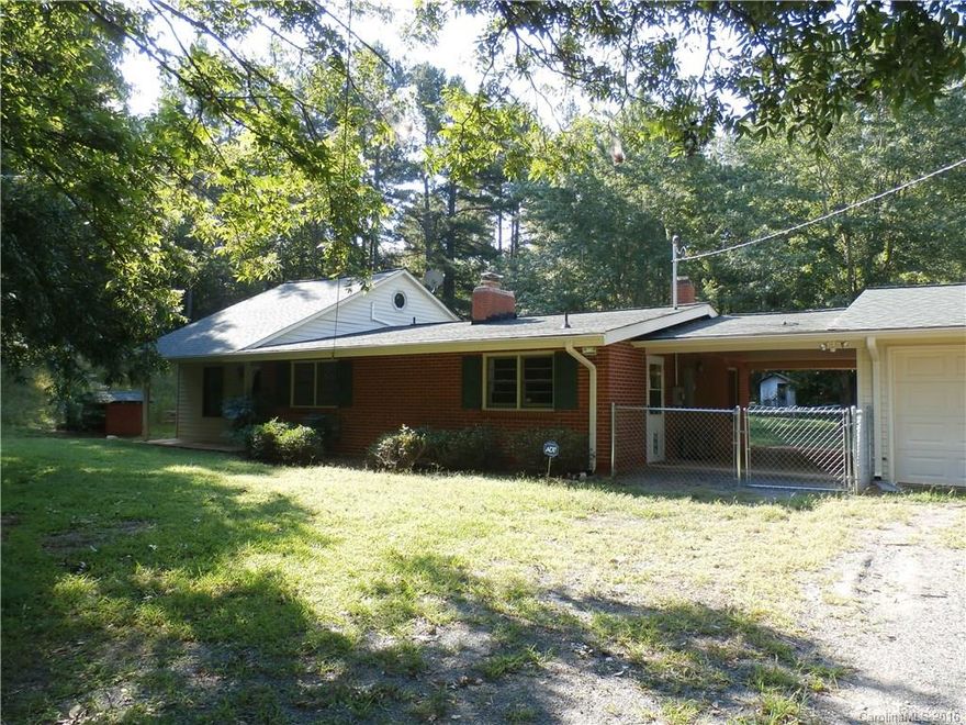 Instant equity! Priced $10K below appraised value! If you are looking for a great home w/lots of land and wooded privacy, this is the home for you! Great ranch home on private lot has two car attached garage, shed and  separate storage building too! Fenced yard around home and hot tub too! Covered breezeway! Oversized great room w/fireplace. New carpeting downstairs. Bedroom/bonus room on  second floor! Don't miss this great home, make your appt. today!