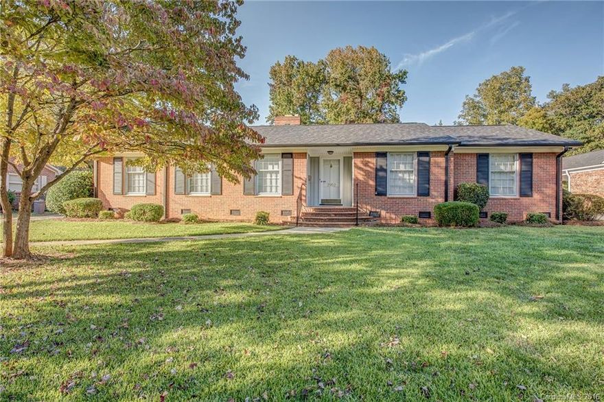 Gastonia Charmer! This bright, sun filled, brick ranch home welcomes you with it's gorgeous original Hardwood floors and Crown molding throughout. Gas log fireplace in cozy den that can also be used as a home office. Kitchen has updated tile flooring and granite counter tops. Updated master bathroom & spacious spare bedrooms. Sunroom off of kitchen. Fully fenced in backyard with spacious patio area. Home is move in ready & minutes from I85. HVCA from '10. Interior recently painted, 2015.