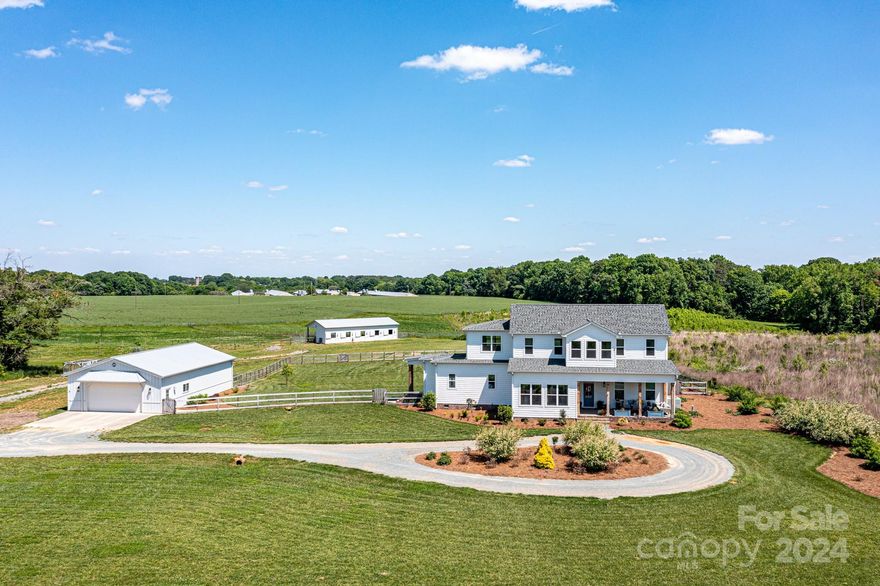 Welcome Home to Tank Top Farm!Unionville area located approx 7 minutes to the 74 Bypass. Gorgeous Farm wonderful for all animal lovers with 10+acres, barn, pastures, 3 plus car detached garage & beautiful home. The house is a modern farm style, white hardy board siding w/3172 sq ft. Has a deep front porch & large screened porch with gas fireplace perfect for morning coffee or cozy nights.Fenced back yard. Primary BR down w/ luxury bath & door to porch, 2 bedrooms up w/ loft area, work space & extra bonus/living space area down. 3 full baths & 1 1/2 bath. Large 30x50 garage fits 3 cars with 2 car garage door at front & 1 car garage door on side rear.  Barn is shedrow style with 4 12x24 runs and dry lot with feed/tack room.Pasture is approx 5.5 acres with 4 divided smaller pastures with gates between. Horses, alpaca, sheep etc all welcome here. Water filtration system,Unique Dog washing shower in utility room. https://vimeo.com/user177831674/review/939554168/bdbdc2ebec Multiple offers