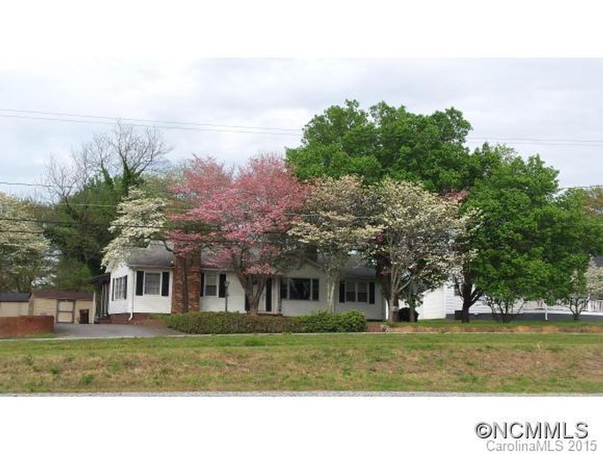An adorable older home with hardwood floors throughout, plaster walls, recently painted interior, comfortable floor plan and a nice screen porch! Was formerly a florists home and has beautiful landscaping: Trees, Flowering Bushes, Bulbs, etc! Even has a small greenhouse. Storage buildings, 1/2 bath needs to be finished, but most of the home has been updated. Large Full Bath - handicap accessible. Must see! Call Agent with Questions!