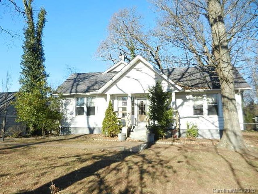 Large corner lot over 2 acres. Circular driveway with plenty of parking. House has 3 bedrooms with 2 full baths. There are 2 fireplaces, one in the living room and one in the dining room. Large rear deck with hot tub to enhance the outdoor entertainment. The rear yard is fenced and ready to explore. The detached 2 car garage has room for a workshop and the room above the garage has a full bath and efficiency kitchen along with a deck. Easy access to I-485.