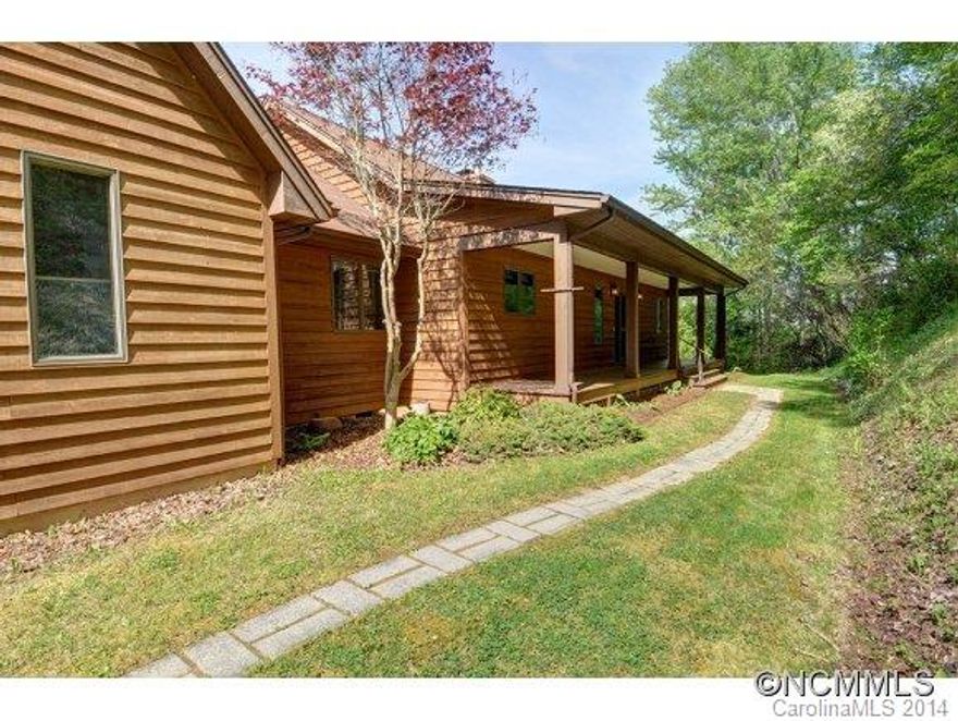 Hidden in the Hills you'll find this 3BD/3BA home with breathtaking views from almost every room! Inviting open living rm w/wood burning fp, rooms for teenagers/guests, kitchen w/breakfast nook, large master, laundry and 2-car garage w/heated workshop. Also new HVAC, flooring, kit appliances, granite counter tops in kit & baths on the main level.  Lower-level living includes family rm w/wood-burning stove, 2nd MST Suite plus craft rooms.