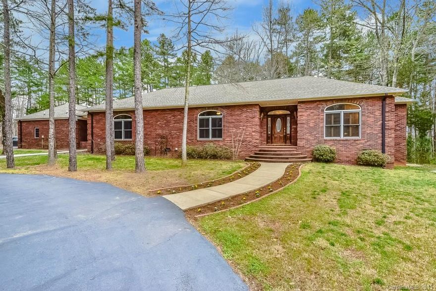 This Incredible all brick ranch sits on 5.5 acres.Open floor plan features 3 beds and 2.5 baths, Upgrades galore. New roof, new hardwoods, new carpet! 2 fireplaces, Central Vac System. Huge owners suite with trey ceiling and private bath. Breezeway to oversized 2-car garage with a Bath including a full shower!. If privacy is what you want you need to take a look at this one.