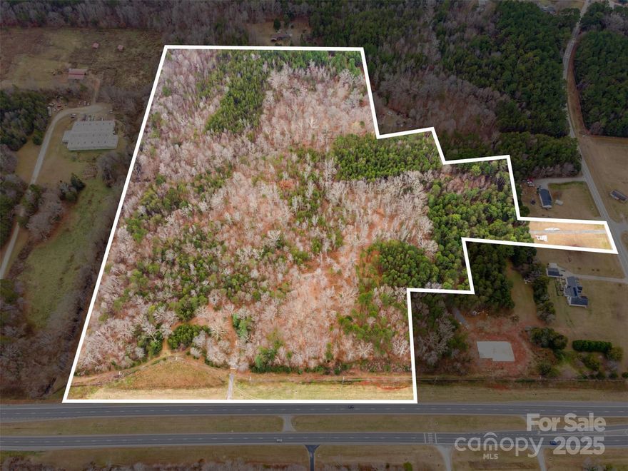 34+/- Acres with frontage on Statesville Blvd and access to Barringer Road.  Great property zoned CBI, allowing for multiple uses.  This includes parcels 316-087, 316-013, and 316-010.  The property is located across Barringer Road from West Rowan Middle School.  Seller is cutting out approximately 1 acre from the parcels, leaving +/-34 acres.