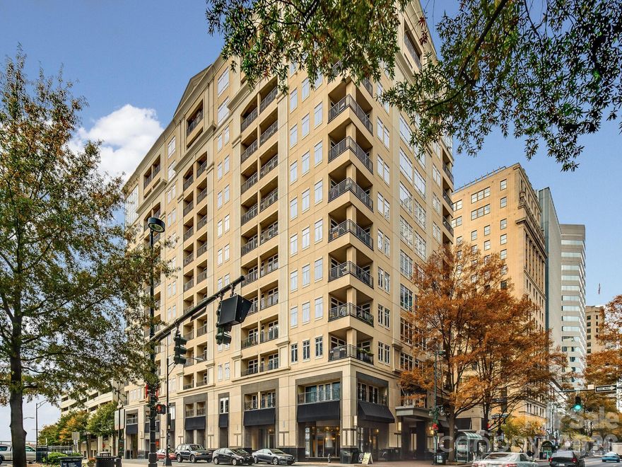 Fabulous front facing corner condo in desirable 230 S Tryon! Features include open and inviting floor plan, beautiful flooring, updated kitchen, gracious living area and wonderful natural light. Kitchen offers an abundance of cabinetry, stainless appliances, large island and is open to dining and living room. Enjoy the large private terrace with city views and access from the living room providing perfect flow for entertaining and casual family living. 
The primary bedroom boasts floor to ceiling windows and a large walk-in closet.  The primary bath includes a separate shower, soaking tub and dual sink vanity.  The secondary bedroom features an ensuite bath and walk-in closet. Condo also offers 2 deeded parking spaces on P4, a storage unit across the hall and is being sold fully furnished.  The secure building features a concierge, fitness center, pool and club room. Conveniently located to some of Uptown's best restaurants, sporting events, museums, concerts and theater events. A must see - don't miss this wonderful opportunity!