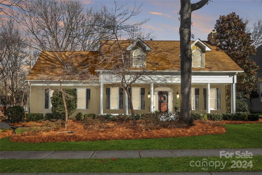 Come and see this beautiful home located on a cul de sac in Cotswold! The large front porch and nicely landscaped front yard highlight this home's curb appeal.  The first floor features a dining room, a living room that is open to the breakfast area and the kitchen, a powder room and laundry room.  The spacious renovated kitchen, with tons of natural light pouring in from the huge picture window, boasts new cabinets, quartz countertops and stainless steel appliances. Upstairs features the primary suite, two secondary bedrooms (one with office nook) and a hall bathroom. The primary suite is a true retreat featuring a large shower with frameless door, dual sinks with quartz countertops and an incredible walk-in closet. The attached garage features epoxy flooring, built in cabinets and lots of storage. The backyard is carefully landscaped around a spacious hardscaped patio and the lot abuts the neighborhood common area, making this beautiful retreat feel even more private. Welcome home.