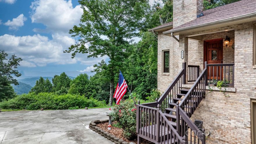 Discover this stunning 4BR/3.5BA mountain retreat on nearly 15 acres in Lenoir, NC, with breathtaking long-range views from inside and the expansive wraparound deck. The main level offers a living room with a wall of windows and a cozy stone wood-burning fireplace, plus a spacious family room great for movie nights or game days. The primary suite is also on the main level with direct deck access—allowing you to take in the scenery. Upstairs features 3 additional bedrooms and a full bath. The walk-out basement includes a game room, music room, gym area, second fireplace, and another full bath. Outdoors, enjoy level yard space with a fire pit and a shed ready to become your workshop or art studio. Quiet and secluded, yet just a short drive to downtown Lenoir, Blowing Rock, and scenic hiking trails, this home is great for year-round living or a vacation escape. Schedule your showing today—properties like this are rare!