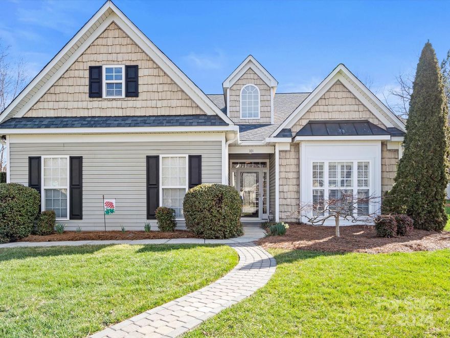 Beautiful zero entry home, located in the quaint neighborhood of The Village on Park, off the beaten path from down town Mooresville. Situated on a cul-de-sac, this well maintained one level patio home is guaranteed not to disappoint! Primary bedroom with tray ceiling, large walk-in closet has an en suite bathroom complete with garden tub. Large, high ceiling living room with gas fireplace and open floor plan is drenched in natural sunlight thru custom plantation shutters that can be found through out the home. Open, spacious kitchen with casual eat-in dining area also features a breakfast bar and pantry. Formal dining room features chair railing and crown molding. This large room could easily be used as a home office or flex space. Enjoy your morning coffee out in the added sunroom and enjoy the seasons from the privacy of the fenced in yard. As part of the HOA, lawn care and landscaping is included! Enjoy mowing and yearly fresh pine straw and hedge trimming! This home is a MUST SEE!