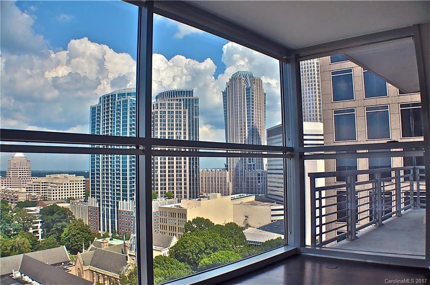 Immaculate 16th Floor Corner Unit with Sunrise views New Wide Plank "REAL" Hardwood Flooring recently Installed and Custom Entertainment Center Upgraded Modern Fans and Lighting also added NEW $7000 HVAC just Installed  - Great Split Bedroom Floor Plan which is Highly Desirable.