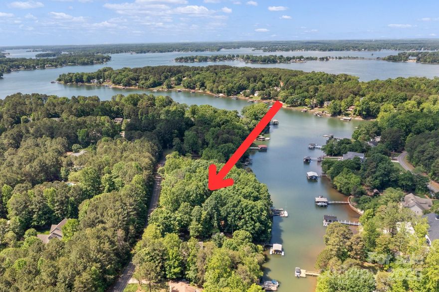 Exceptional Lake Norman Opportunity! Don’t miss this rare chance to own a premier lakefront property in one of Lake Norman’s most desirable areas. This listing includes two parcels totaling 1.62 acres and 359 feet of shoreline, offering endless possibilities for development or personal use. The property at 505 Kemp Road features a home completed in 2023 with 2 bedrooms and 2 full bathrooms. The primary suite is exceptionally spacious, featuring a large bedroom and a luxurious bathroom. Additionally, the basement could be used as a third bedroom. The chef’s kitchen is outfitted with stainless steel appliances, a double oven, and a large center island—perfect for cooking, hosting, or enjoying lake living at its best. The second parcel, 515 Kemp Rd, is a vacant lot. Whether you’re planning to build new, renovate, or invest, this property offers the ideal combination of location, space, and flexibility.
