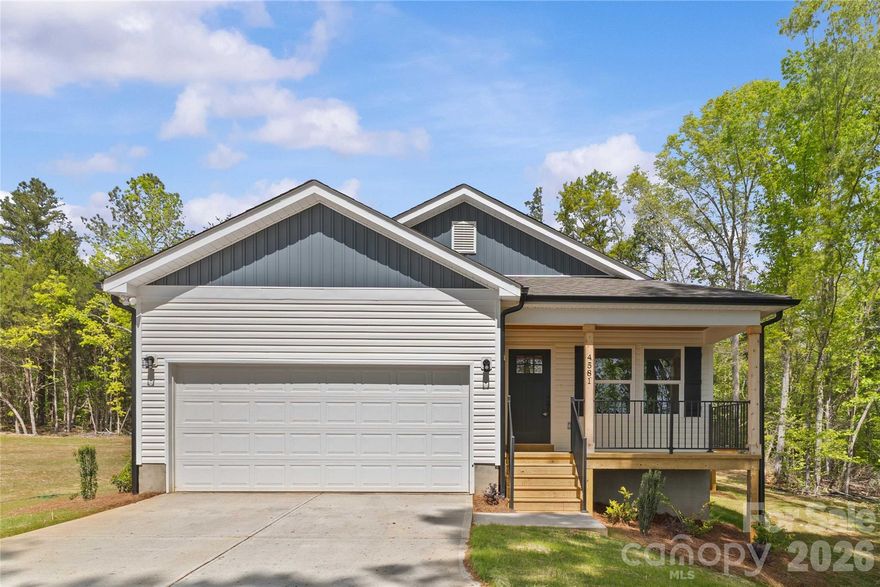 Brand New 3 bed 2 bath home on large 1 acre site partially hidden from the road by a curved drive.
Pull up to the 2 car garage and entoer the front door after pausing on the stained front deck with room to sit outside.
Large side deck will house furniture, grill and people!  Perfect for those who enjoy outdoor space.
The home backs up to the Catawba River Water Supply land so no back neighbors!  Plenty of space and privacy.

Home has vaulted ceilings and an open design for a spacious feel.  Large Master Suite offers a coffered ceiling, fulling tiled master shower and large walk in closet.

Drawing, measurements and school systems will be added soon.