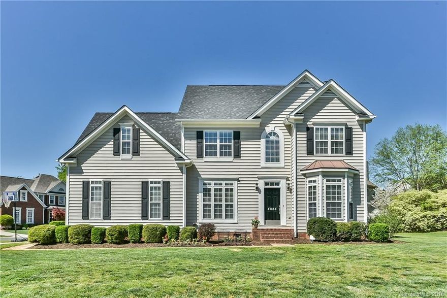 UPGRADES GALORE! This house is in impeccable condition, 4 bed/2.5 bath, granite counters; tile backsplash; new appliances; under cabinet lighting; oversized master bedroom with two closets and granite in bathroom; entire house newly painted; 4th bed/bonus has rec room connected for extra space; X-large 2 car garage and driveway; invisible fence; screened porch recently painted and new screens; upgraded light fixtures and more.  Amenity rich Regent Park close to shopping, dining and I-77.