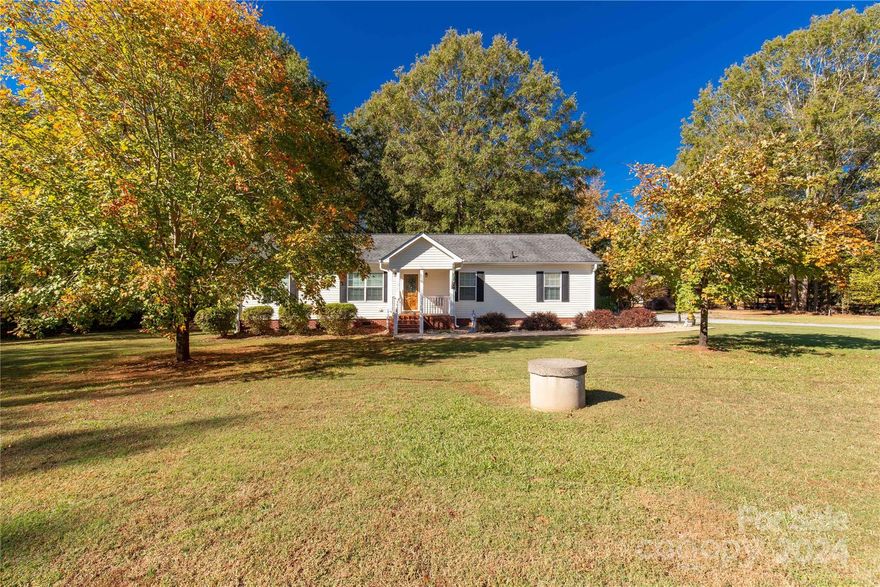 Welcome to 4677 Ramsey Road in charming Sharon, SC! This inviting three-bedroom, two-bath home sits on a generous 1-acre lot, providing both tranquility and plenty of space to make your own. The primary bedroom is generously sized, paired with a large, well-appointed bath for added comfort. Outdoors, the property boasts a 12x24 wired workshop, perfect for projects or extra storage, a two-car detached carport, and an expansive screened-in back porch ideal for year-round outdoor relaxation and entertaining. Inside, the spacious kitchen and dining area are ideal for hosting gatherings, with an adjoining sitting room that adds flexibility and comfort to the layout. The kitchen includes ample cabinetry and workspace, making meal prep a pleasure. With room to expand and personalize, this property offers a fantastic blend of cozy living and rural charm. Don’t miss out—schedule your showing today to experience the potential of this charming home and its peaceful surroundings for yourself!
