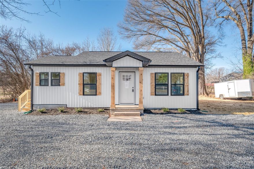 Completely remodeled modern/farmhouse style ranch! Open concept living room and kitchen offers an easy flow! Elegant kitchen with upgraded fixtures, white shaker cabinets with soft closing drawers, quartz countertops, white subway tile backsplash. Stainless steel appliances are included! Luxury vinyl plank flooring throughout and plush carpet in the bedrooms. Contemporary style ceiling fan in the living room. Board and batten siding in the front. Beautiful flat property .59 ac with lots of outside room to entertain!
