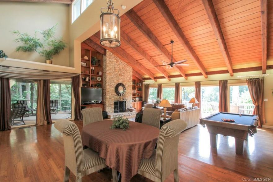 Beautifully updated ranch on pristine lot overlooking the 13th hole. Hardwoods throughout the main living area. Large kitchen opens to huge great room perfect for entertaining. Relaxing screened porch attached to wrap around deck overlooking outstanding views. Complete renovation in 2012 and new roof in 2011. Community features Golf Course, Tennis Courts, Marina, Beach Access, and much more. Virtual tour link below- 
http://properties.houselens.com/14492/36+Fairway+Ridge%2c+Lake+Wylie+SC+29710