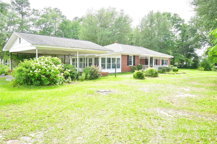 Brick ranch, 2-bedroom. / 2 bath country home out from Kershaw is ready & ON THE MARKET! It's sitting on a .96 acre lot w/ lots of shrubbery, flowers, fruit trees....You can just tell this home was LOVED by its previous owners. There is even a GARDEN SPOT!  It's situated between Kershaw & Bethune.  There are several out buildings on the property.  Home is being SOLD 'as is'.  NO REPAIRS TO BE MADE.  Make your apptm to view...CONVENTIONAL OR CASH ONLY.  SELLER'S ARE NEGOTIABLE.