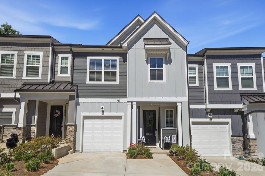 Beautiful and meticulously cared for 3-bedroom, 2.5-bath townhome located in the desirable Ashburn subdivision in Fort Mill. This inviting home offers an open floorplan filled with natural light and stylish upgrades throughout. The kitchen features upgraded white cabinetry, White Storm quartz countertops, stainless steel appliances, a large center island, and a generous walk-in pantry. Upstairs, the spacious primary suite offers a luxurious en suite bath with a custom tile shower and built-in bench, along with a walk-in closet with access directly to the upstairs laundry room. A versatile loft/sitting area, two additional bedrooms, and a full bath complete the second floor. Conveniently located near award-winning schools, shopping, dining, and with easy access to I-77, this home combines comfort, style, and convenience in one exceptional package.