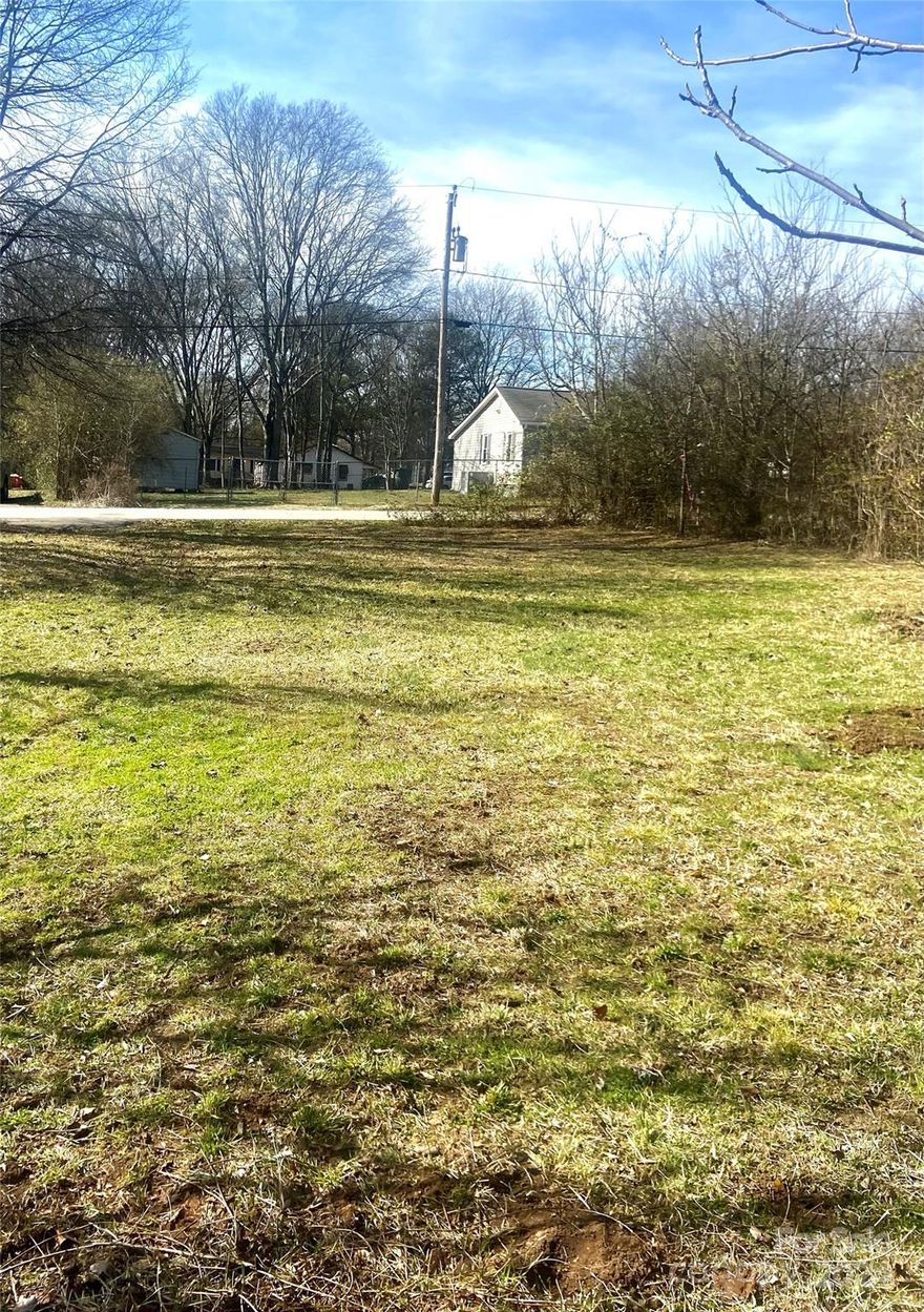 Uncover the potential of this lot just minutes from historic Rock Hill! A fantastic opportunity awaits for you to build in this thriving area. Recent comps within 0.50 miles reflect new construction homes closing at up to $340,000. Surveys/plot maps have been completed as reference, streamlining the process for you. Boundary lines have been marked. A house was previously on the lot until 2009, so water and sewer were previously utilized.